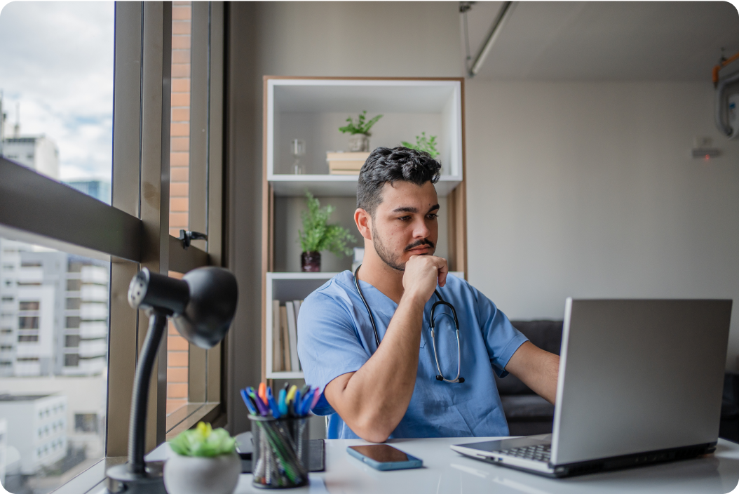 male looking at computer